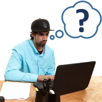 A man using a computer with a thought bubble showing a question mark.